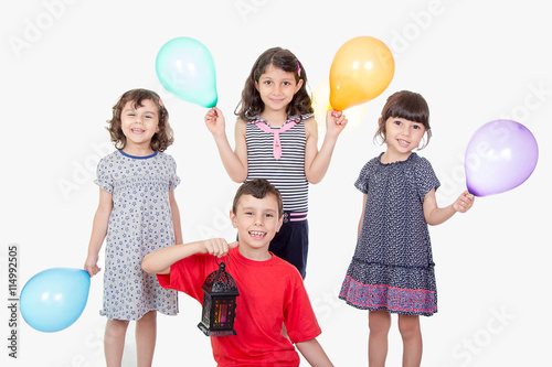 Happy kids celebrating Eid El Fitr photo