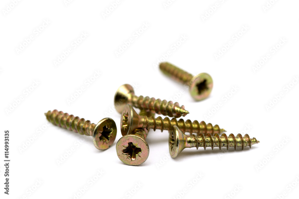 Scattered wood screws isolated on white background Scattered wood screws isolated on white background