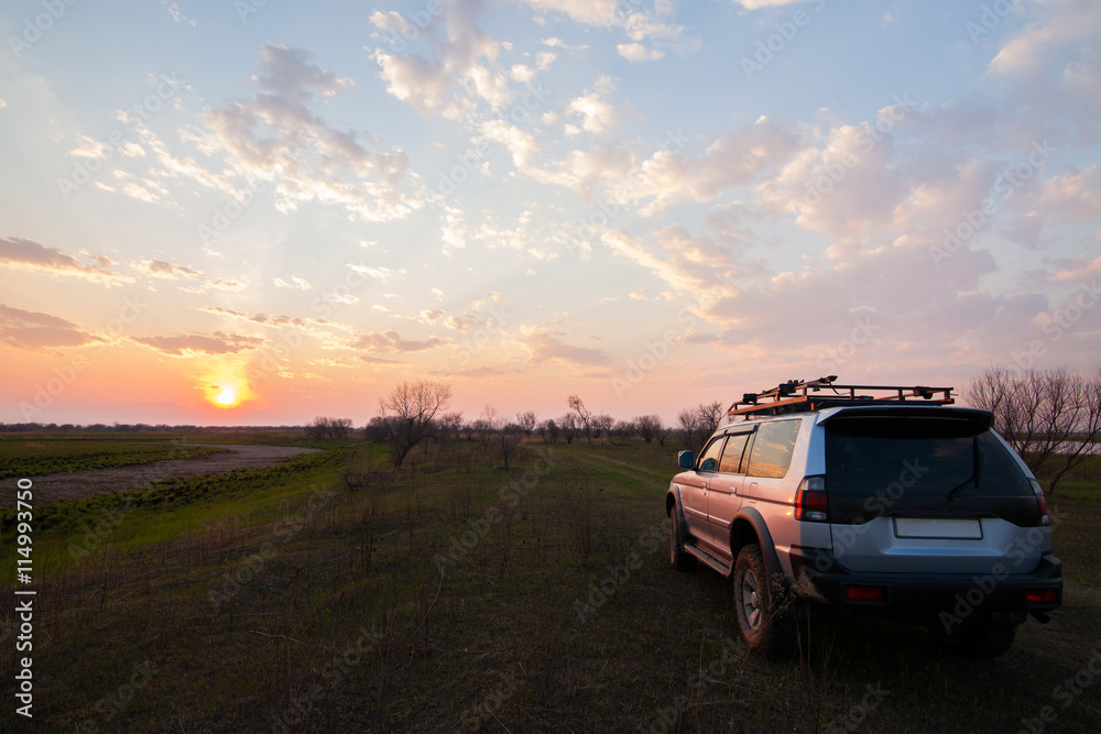 PRIAMURSKY, RUSSIA - MAY 08, 2016: 4x4 SUV on country road at su PRIAMURSKY, RUSSIA - MAY 08, 2016: 4x4 SUV on country road at su