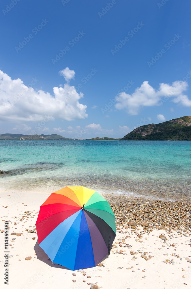 Colorful umbrellas on beach.