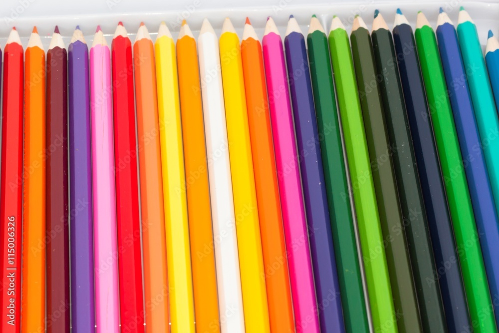 Set of colored pencils in a box on a white background
Set of colored pencils in a box on a white background