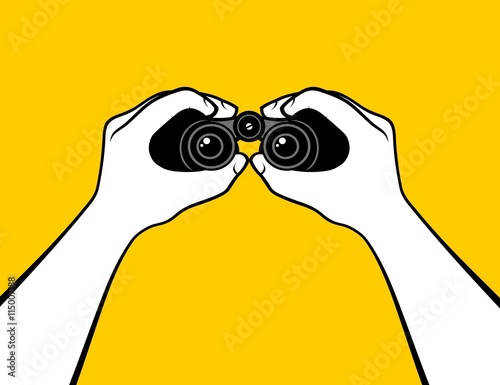 Hands holding binoculars