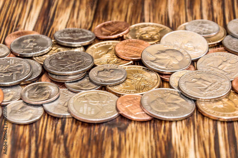 American coins on the wooden background American coins on the wooden background
