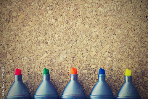 Color highlighters on cork board