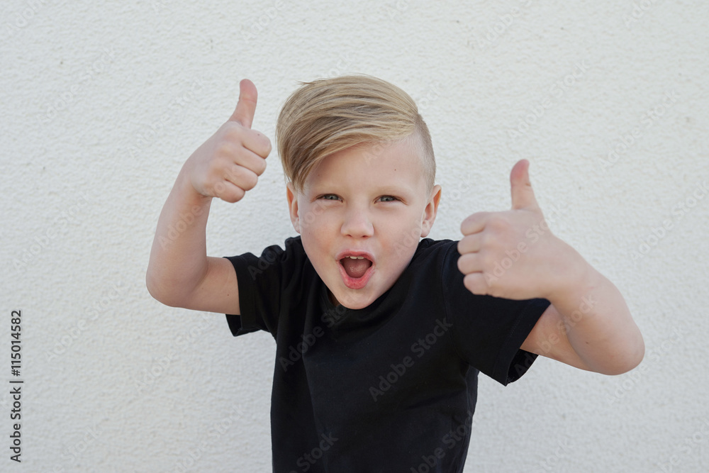 young emotional boy on bright background young emotional boy on bright background