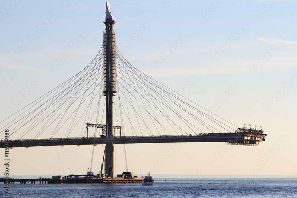 Fototapeta premium construction of bridge at sunset