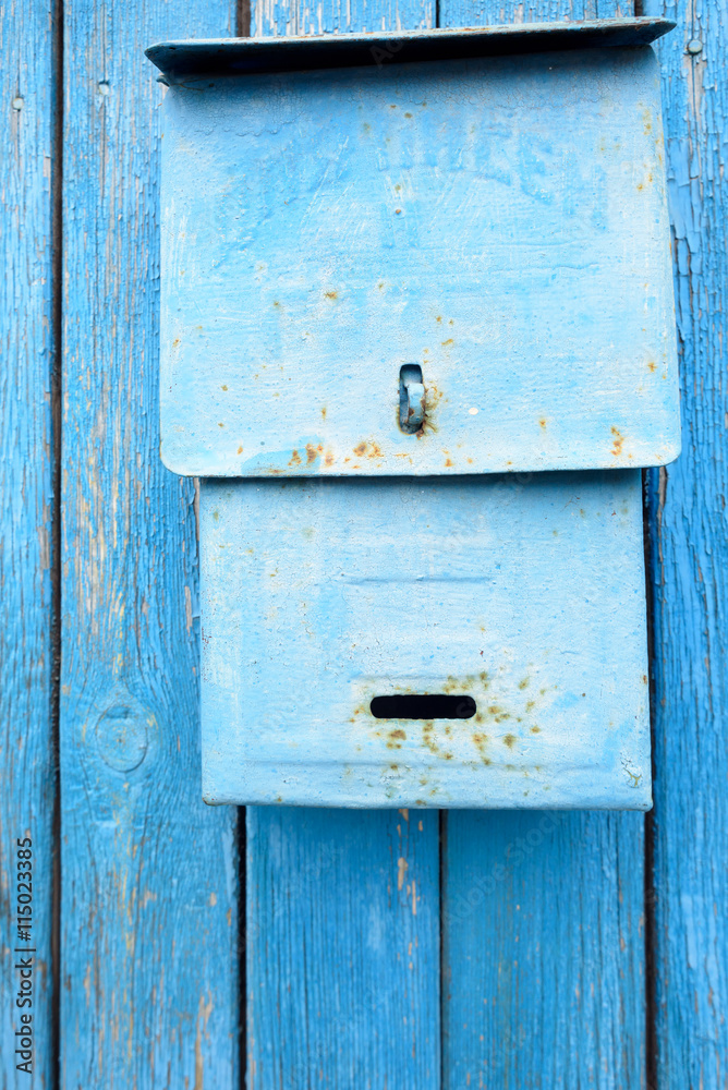 Blue Painted Metal Retro Postbox on Wood