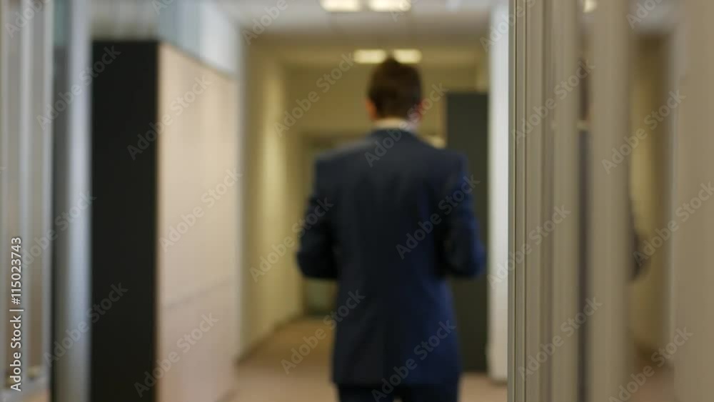 Businessman is Walking Away. Shallow depth of Field, 4k UHD 2160p, dolly slider shot Businessman is Walking Away. Shallow depth of Field, 4k UHD 2160p, dolly slider shot