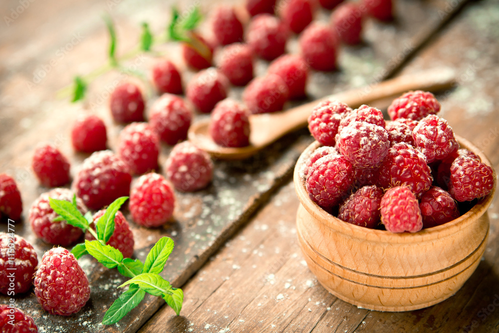 Ripe sweet raspberries on wooden background Ripe sweet raspberries on wooden background