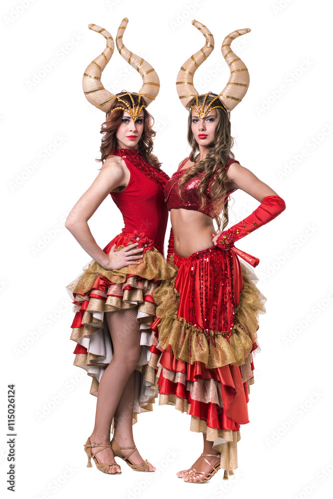 Two women dancers with horns. Isolated on white background.