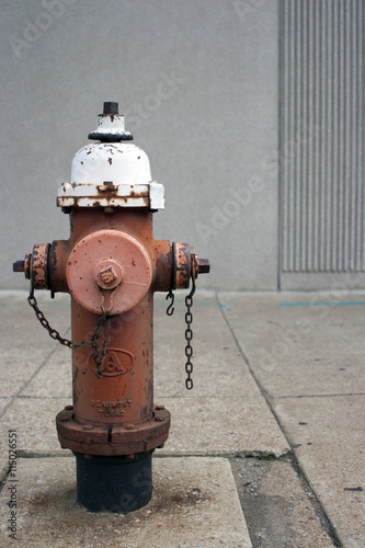 Old rusty fire hydrant on a city street