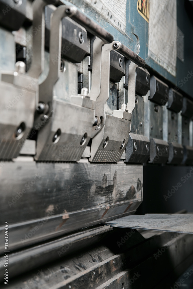operator bending metal sheet by sheet bending machine operator bending metal sheet by sheet bending machine