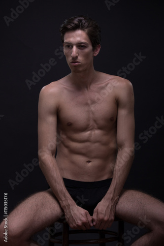 Nude young man posing model sitting Caucasian skinny, slim, fit