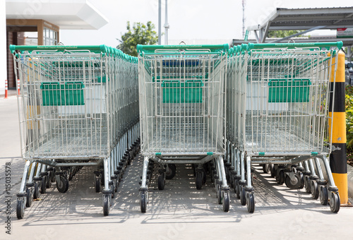 Row of shopping carts on a parking lot