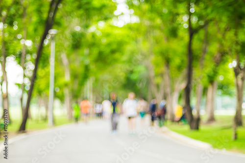Fototapeta Naklejka Na Ścianę i Meble -  Blurred background ,People exercise in park ,pale vintage filter