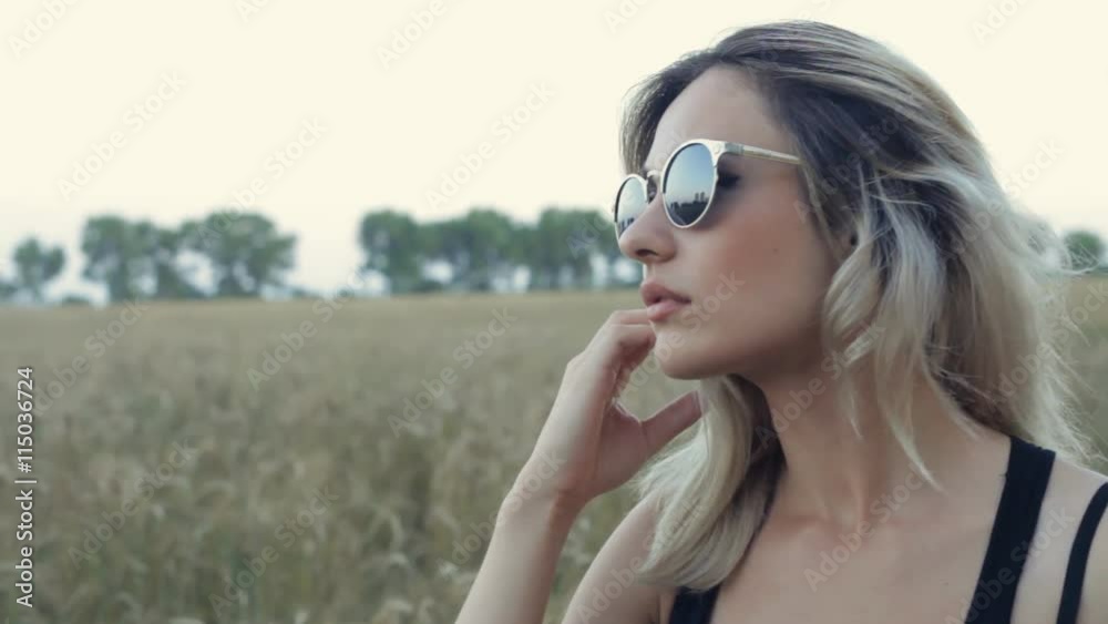portrait of beautiful blonde girl dressing sunglasses and posing portrait of beautiful blonde girl dressing sunglasses and posing