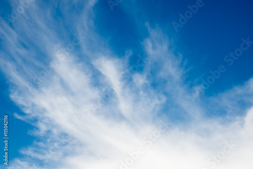 Blue sky and clouds background.