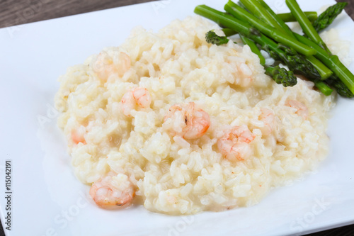 Risotto with shrimps and astaragus photo