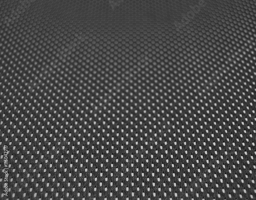 Black mesh on the back support of an office chair