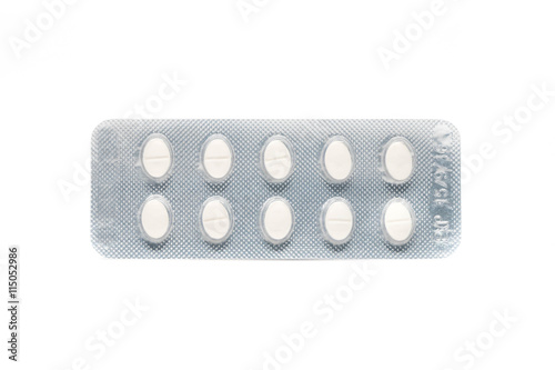 white pils tablets in blister pack isolated on white background.