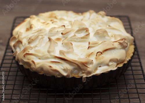 Lemon meringue pie on a cooling rack