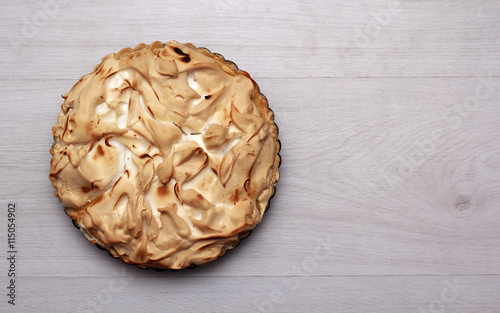 Lemon meringue pie on a cooling rack