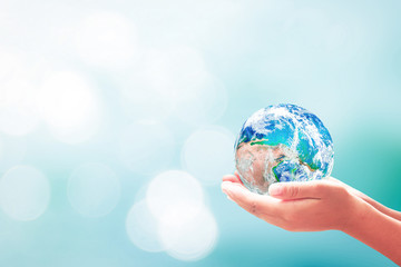 Hands holding earth globe for global environment, sustainability and ecology protection concept banner