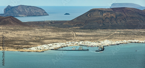 View of the island La Graciosa with the town Caleta de Sebo photo