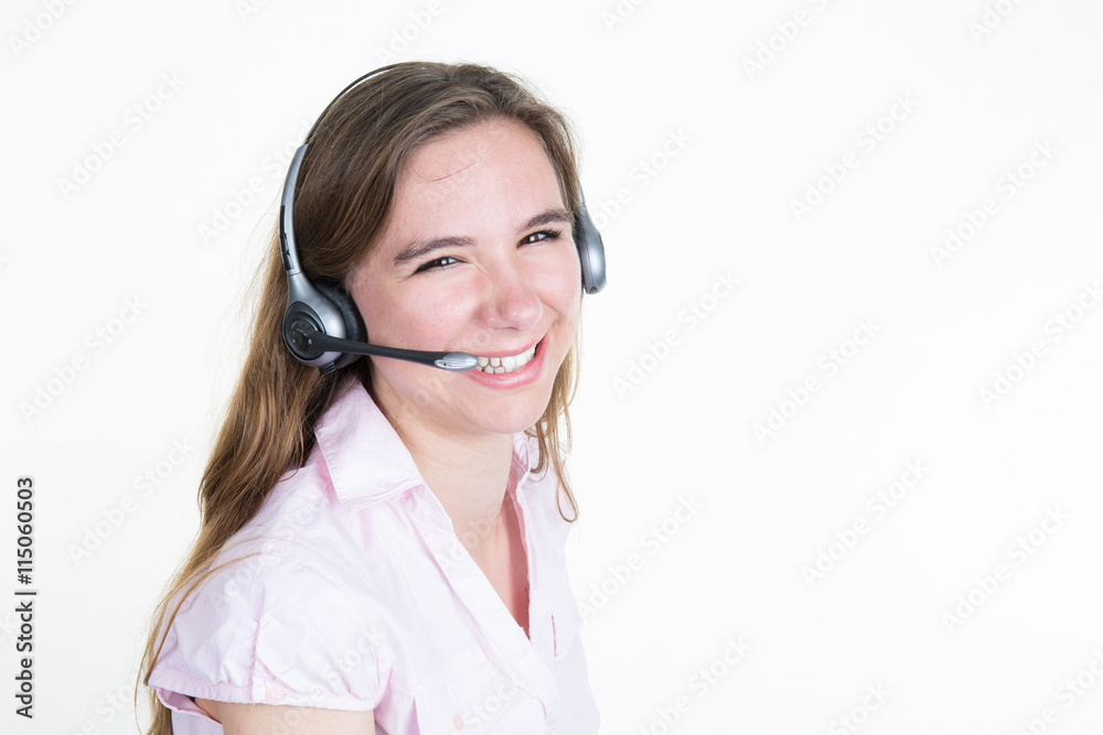 Young blond woman isolated with headset smiling Young blond woman isolated with headset smiling