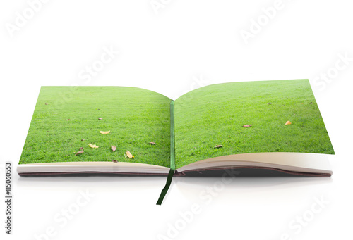 World environment day concept: Open book of nature in a beautiful green meadow on white background