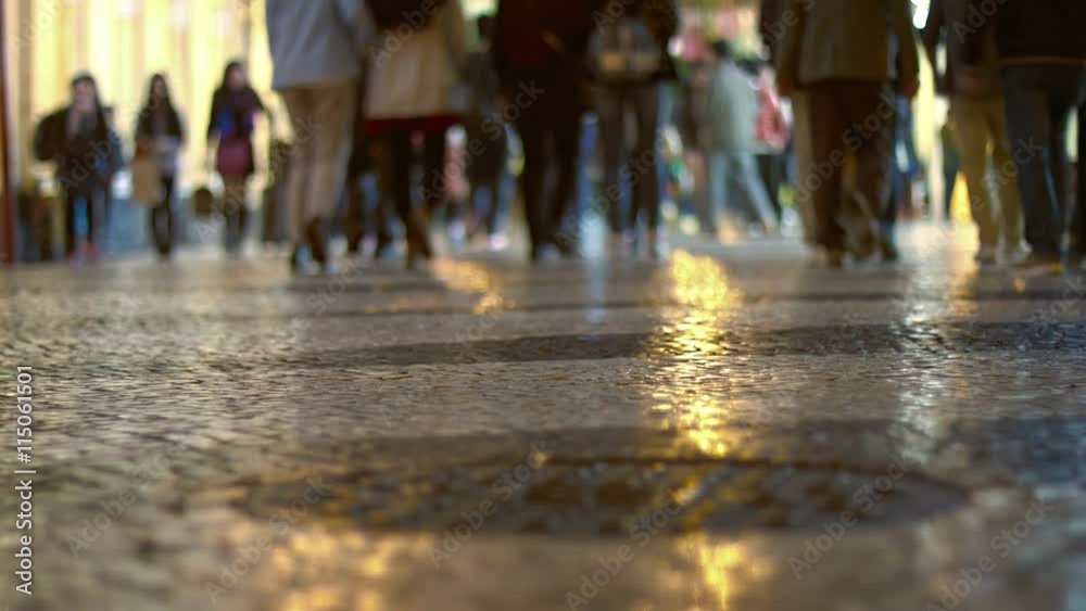 Video UltraHD - This abstract, timelapse shot, taken from a low angle, shows a crowd of pedestrians in casual attire, strolling through a plaza in the afternoon. Video UltraHD - This abstract, timelapse shot, taken from a low angle, shows a crowd of pedestrians in casual attire, strolling through a plaza in the afternoon.