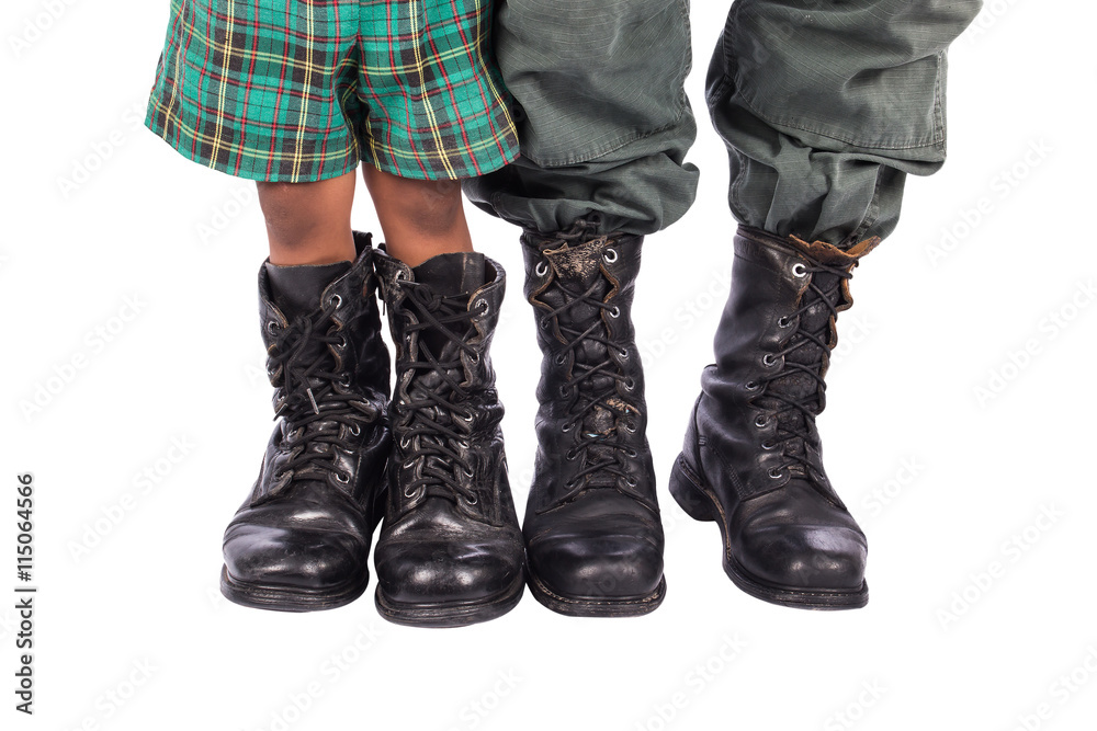 Close-up of little boy and dad wearing shoes Close-up of little boy and dad wearing shoes
