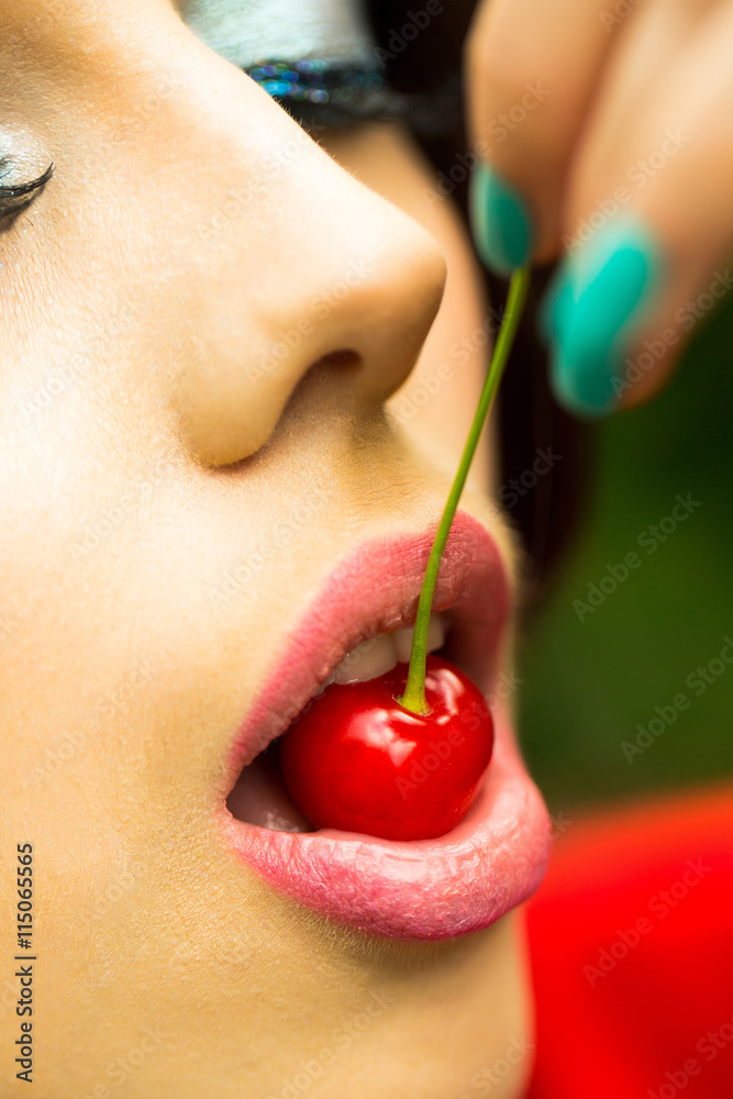 female lips with cherry female lips with cherry