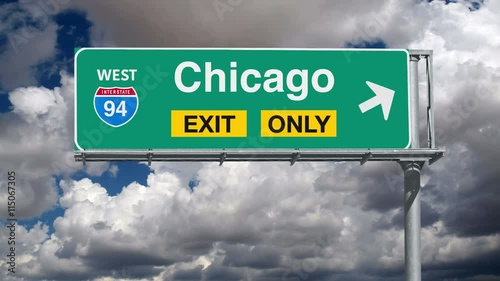 Chicago Illiois Interstate 94 exit only sign with time lapse clouds. photo