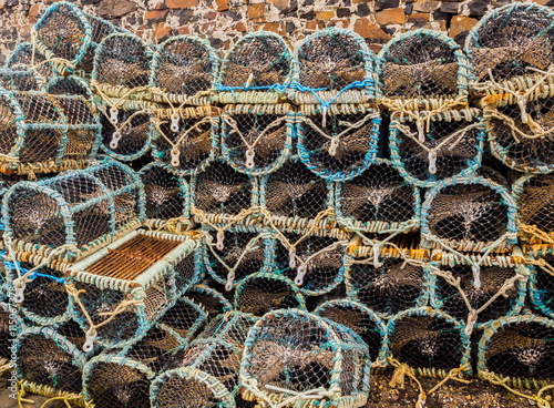 Lobster pots at Croig Harbour, Dervaig, Island of Mull, Scotland, UK photo