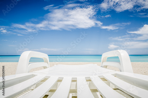deckchair on a beach, seashore © Nicodape