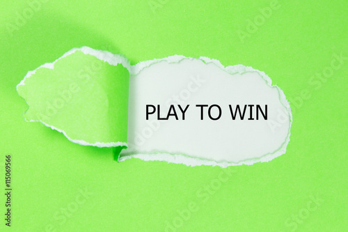 PLAY TO WIN message written under torn paper.