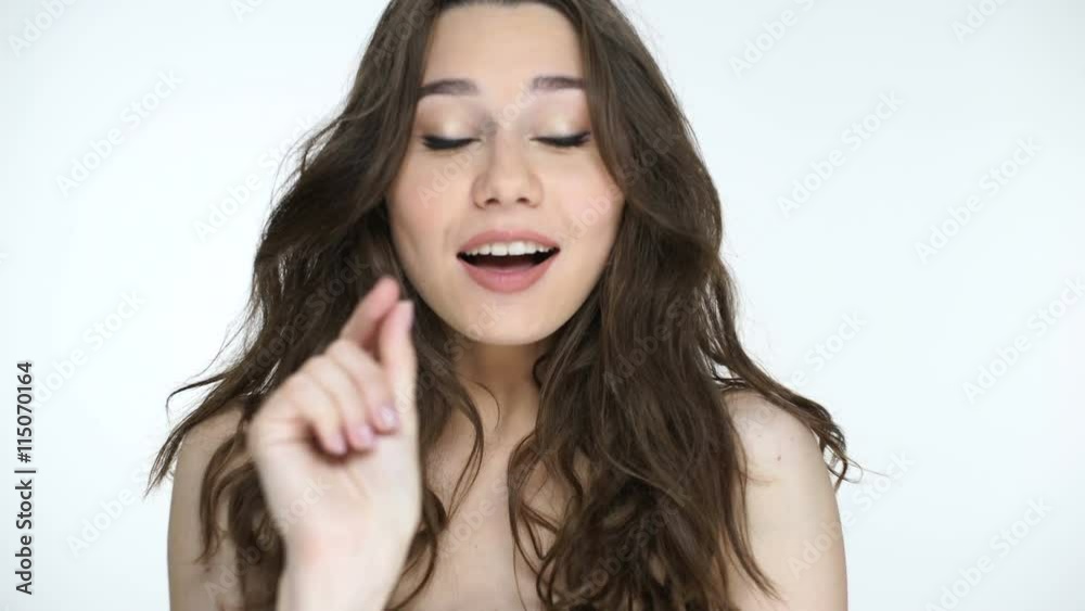 Beautiful young girl trying to say something Beautiful young girl trying to say something
