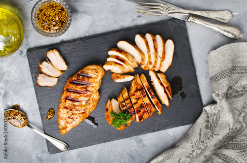 Grilled chicken fillets in a spicy marinade