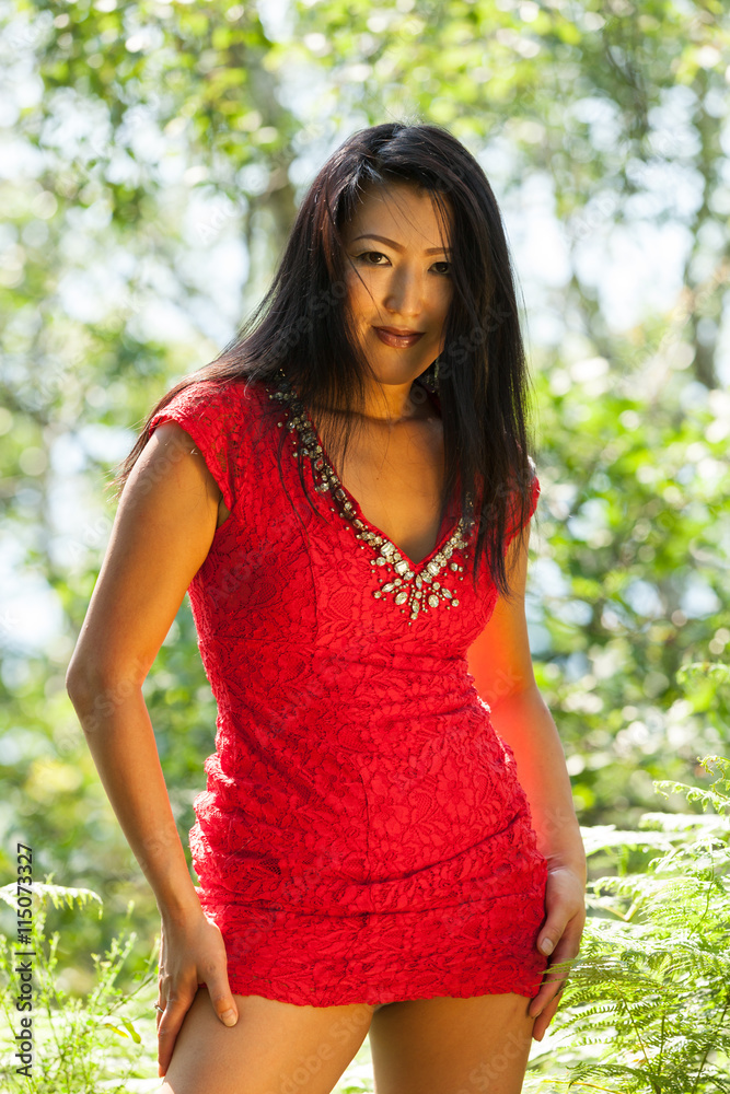 Sexy Asian woman with red dress Stock Photo | Adobe Stock