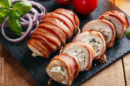 chicken breast stuffed feta cheese and herbs wrapped in bacon photo
