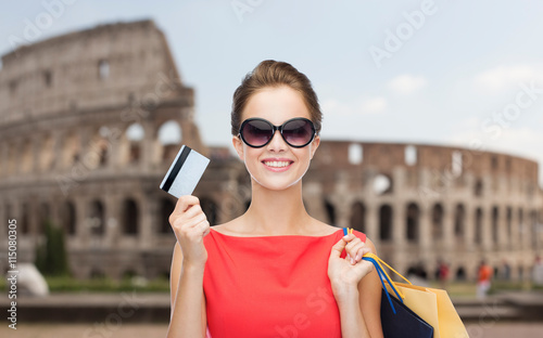 Canvas Print woman with shopping bags and credit card in rome
