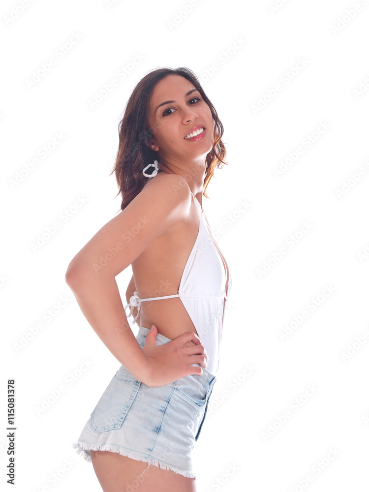 young woman in white bathing suit and denim shorts young woman in white bathing suit and denim shorts
