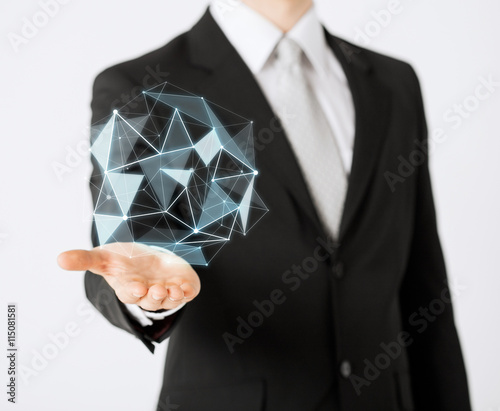 man with virtual low poly projection on hand