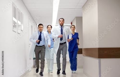 group of medics walking along hospital