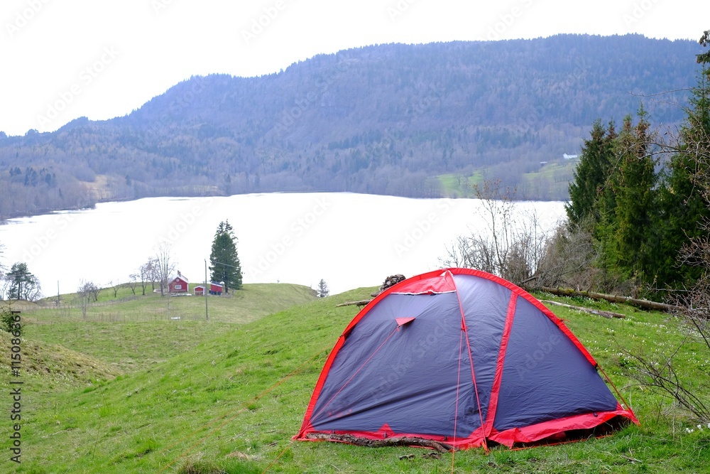 Tent on mountain lake
