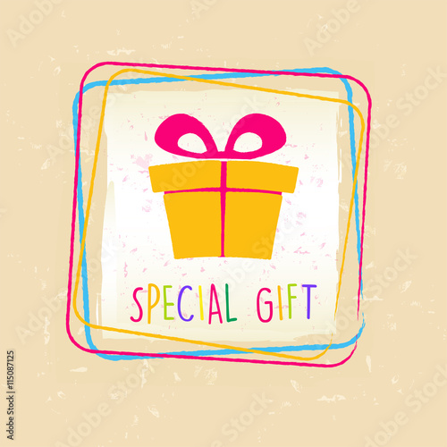 special gift with present box sign in frame over old paper backg