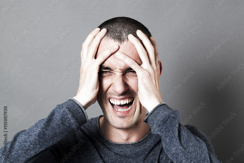 angry young man holding his head, screaming his burnout Stock Photo ...