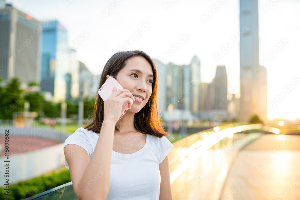 Woman talking to mobile phone
