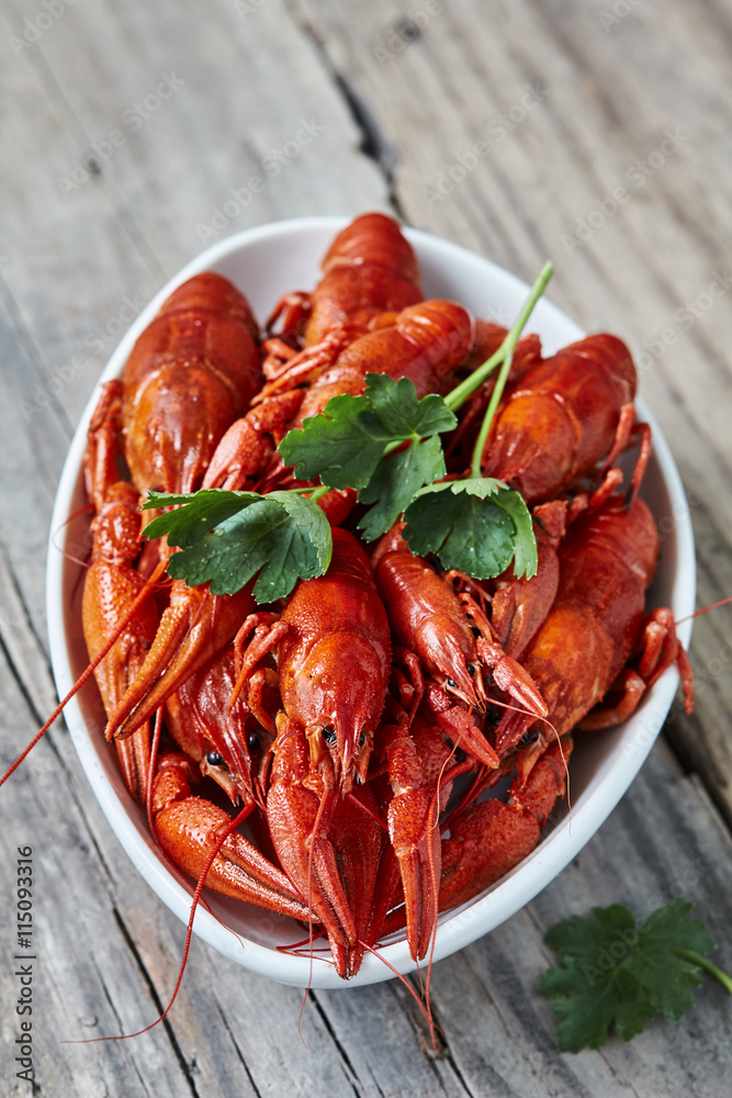 Red boiled crayfish in a white bowl Red boiled crayfish in a white bowl